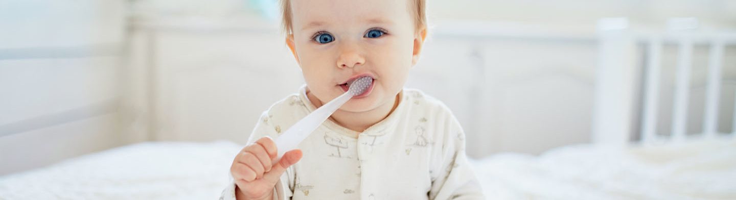 From what age does my baby need a tooth brush ? cover